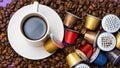 Used Nespresso capsules on coffee beans, the problem of contamination of coffee capsules. Royalty Free Stock Photo