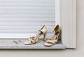 Used, old, beige women`s shoes on a window sill, Berlin, Germany