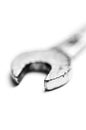 Used old wrench closeup isolated white background Royalty Free Stock Photo