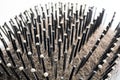 Used paddle hairbrush full of fallen hair, close up macro shot, no people Royalty Free Stock Photo