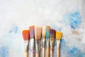Used paint brushes. A bunch of brushes for painting with oil and acrylic paints. Artist paintbrushes in a artist studio Royalty Free Stock Photo