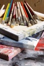 Used paint brushes on canvas Royalty Free Stock Photo