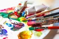 Used palette of the artist with mixed colors of acrylic paints c Royalty Free Stock Photo