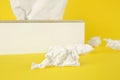 Used paper tissue and holder on background, closeup Royalty Free Stock Photo