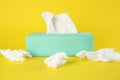 Used paper tissues and box on background Royalty Free Stock Photo