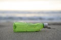 Used Plastic bottle waste discarded on sea coast ecosystem,environmental pollution contamination Royalty Free Stock Photo