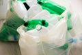 Used plastic bottles in the white bags Royalty Free Stock Photo