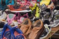 Used or preloved shoes on display at the market. Closed-up