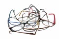 Tangled pile of old reading glasses