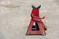 Used red high lift jack stand Royalty Free Stock Photo