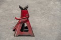 Used red high lift jack stand Royalty Free Stock Photo