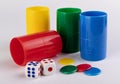 Used shaking color cups with tokens and dices to play Parcheesi Royalty Free Stock Photo