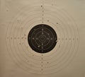 Used shooting paper target with bullet holes Royalty Free Stock Photo