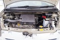 Used silver Toyota Passo with an engine of 1.3 liters front engine compartment view on the car snow parking after preparing for Royalty Free Stock Photo