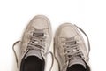 Used sneakers isolated on white. Casual dirty footwear. Urban Royalty Free Stock Photo