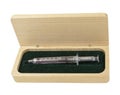 Used Syringe in Wooden Box Royalty Free Stock Photo