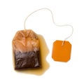 Used tea bag with the label on white, mockup template Royalty Free Stock Photo