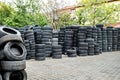 Used tire stacks in Workshop vulcanization yard