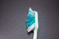 used toothbrush isolated on dark background Royalty Free Stock Photo