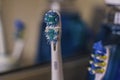 Used toothbrushes with rough bristles in bathroom