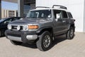 Used Toyota FJ Cruiser display at a dealership. With current supply issues, Toyota is buying and selling many pre-owned cars