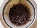 Used wet used coffee grounds in a coffee percolator funnel