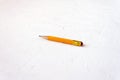 Used worn pencil with eraser  on white background. Selective soft focus. Text copy space Royalty Free Stock Photo