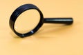 Used, worned, scratched magnifying glass close up shot Royalty Free Stock Photo