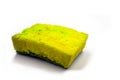 Used yellow sponge for dishwashing photo on white background. Foam rubber sponge with microbe and stain. Aging concept