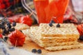 Useful breakfast with dietetic crackers and red tea with lemon. Wild berries, physalis Royalty Free Stock Photo