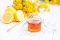 Useful and delicious honey and lemon. Honey dipper. The concept