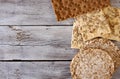 Useful dietary, crispbread, flakes, buckwheat, cookies with sunflower on a wooden background Royalty Free Stock Photo