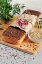 Useful home-made vegan sourdough bread from green buckwheat with flax and sunflower seeds. Raw healthy and proper nutrition Royalty Free Stock Photo