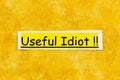 Useful idiot idiom unaware naive credulous used person deceive Royalty Free Stock Photo