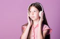 Useful information. home schooling. small girl pupil in headphones. child study online. E learning with ebook. girl