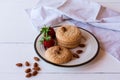 Useful Lenten cookies from almond flour with strawberry on rustic wooden background. selective focus