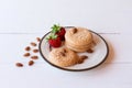 Useful Lenten cookies from almond flour with strawberry on rustic wooden background. selective focus