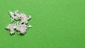 Useful mineral asbestos close up on a green background Royalty Free Stock Photo