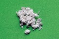 Useful mineral asbestos close up on a green background Royalty Free Stock Photo