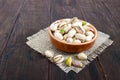 Useful nuts - pistachios in a ceramic bowl Royalty Free Stock Photo