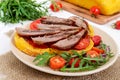 Useful sandwiches: goose breast on pumpkin bread, salad from tomatoes, arugula, red onions