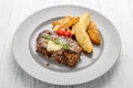 Useful and tasty food, grilled beefsteak with french fries