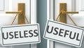 Useless or useful as a choice in life - pictured as words Useless, useful on doors to show that Useless and useful are different Royalty Free Stock Photo