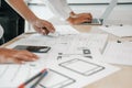 User experience UX designer designing web on smart phone layout. UI developer planning working on mobile application prototype Royalty Free Stock Photo