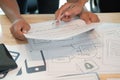 User experience UX designer designing web on smart phone layout. UI developer planning working on mobile application prototype Royalty Free Stock Photo
