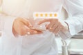 user give five stars rating satisfied feedback review for customer service or app experience quality survey concept