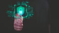 User hand interacts with a digital lock icon, symbolizing cyber security and data protection.