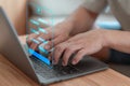 User use a laptop computer with technology smart robot AI chatbot for chat.