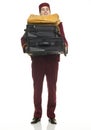 Usher carries suitcases Royalty Free Stock Photo