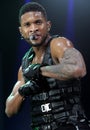 Usher performs in concert